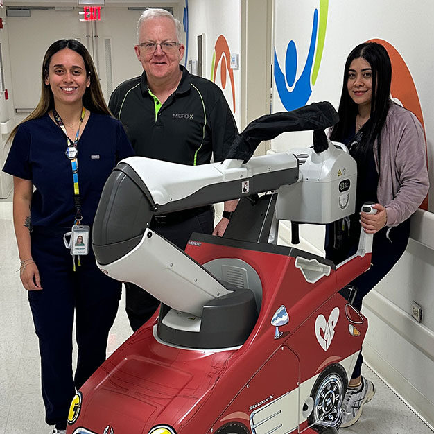 Micro-X Rover Plus mobile X-ray system featuring custom child-friendly decorative pediatric shroud